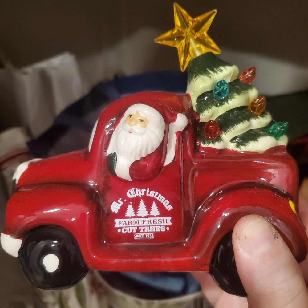Santa Driving a Red Pickup Truck with Light Up Christmas Tree